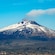 Mount Etna in Catania Italy with smoke pouring out of the top